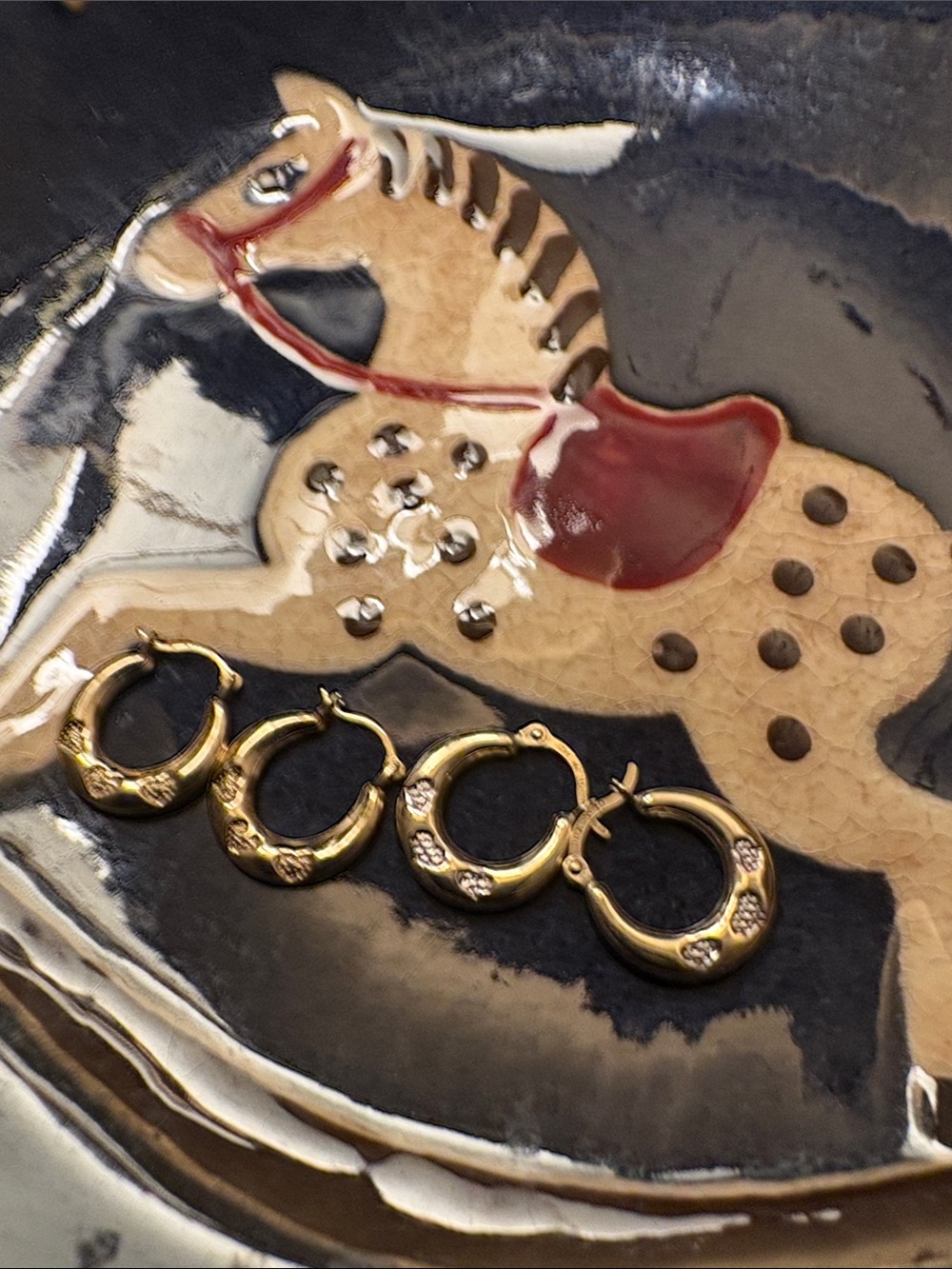 (2)pairs of small. 10k gold heart hoop earrings